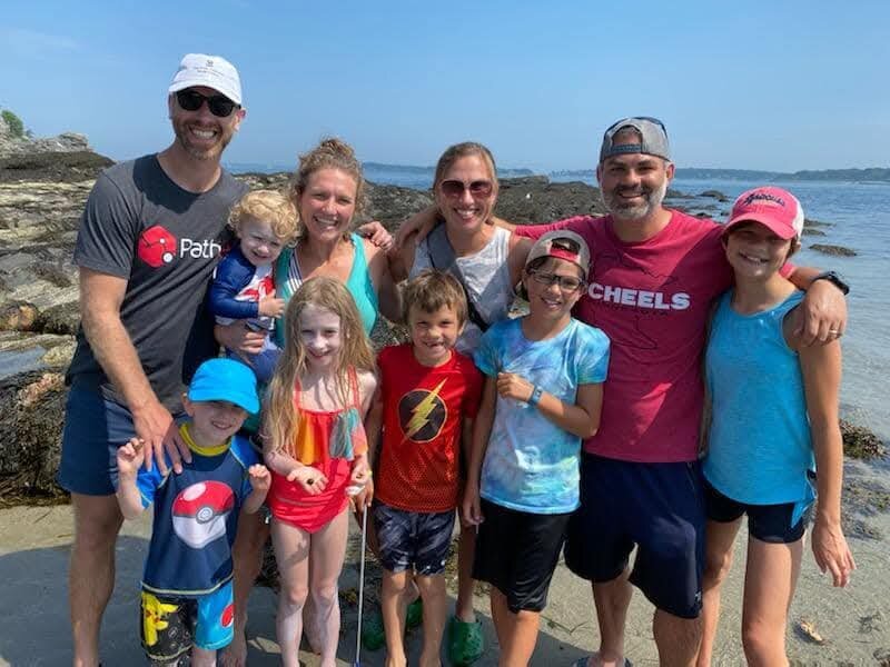 The four of us — Nick, Katie, Zach, and Brigette — with the cousins on a Maine beach.